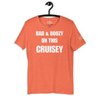 Bad and Boozy on this Cruisey Cruise Shirt in Heather Orange by the cruise closet